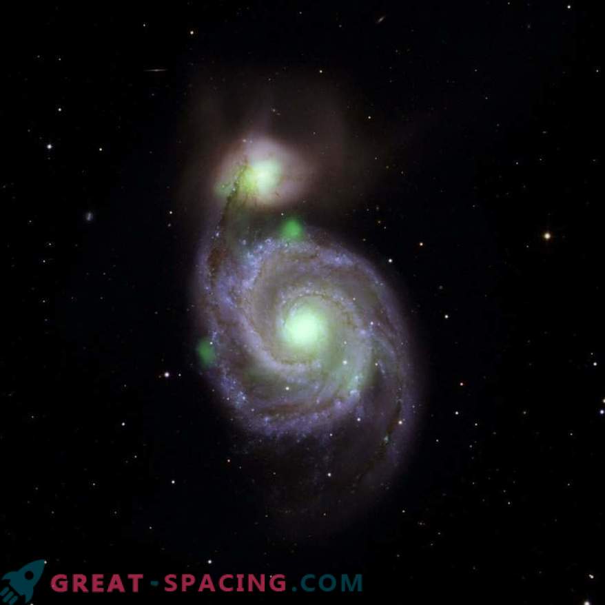 Il minuscolo oggetto luminoso eclissa i buchi neri supermassicci nella confluenza galattica