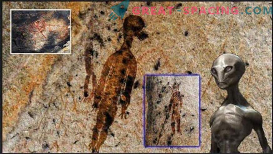 Vilken typ av varelser är avbildade på en 10.000 år gammal grottfigur