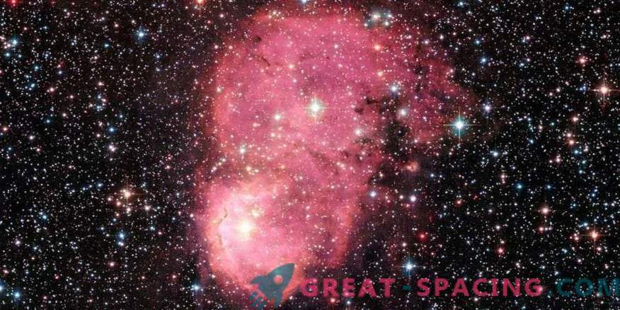 Festlig glödande galaktisk nebula för Hubble